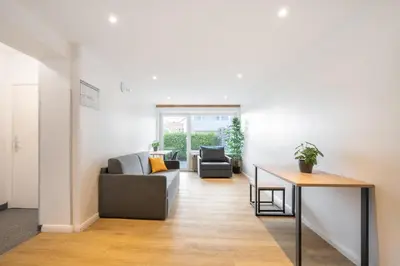 Ein Sitzbereich in der Unterkunft Homaris Apartments München Laim
