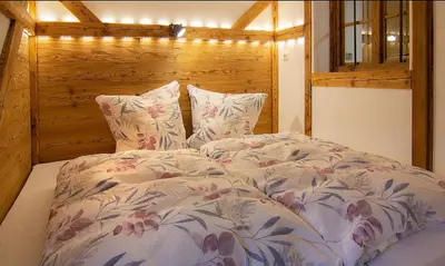 Ein Bett oder Betten in einem Zimmer der Unterkunft Auf der Tannermühle
