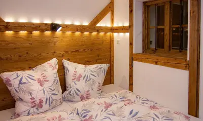 Ein Bett oder Betten in einem Zimmer der Unterkunft Auf der Tannermühle