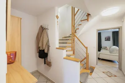 Ein Bett oder Betten in einem Zimmer der Unterkunft CATO Ferienhaus