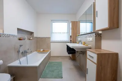 Ein Badezimmer in der Unterkunft Rosenbogen