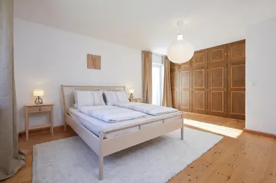 Ein Bett oder Betten in einem Zimmer der Unterkunft Ferienwohnung zum Hirschgarten