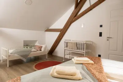 Ein Bett oder Betten in einem Zimmer der Unterkunft Sauna Oase - stay play relax