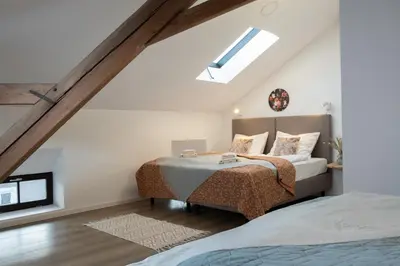 Ein Bett oder Betten in einem Zimmer der Unterkunft Sauna Oase - stay play relax