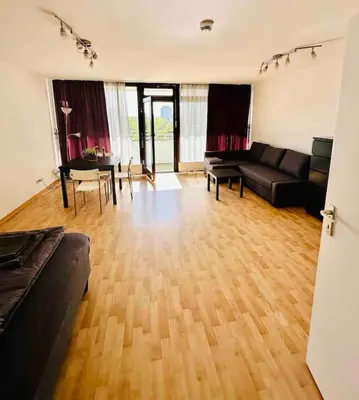 Ein Sitzbereich in der Unterkunft Schwabing-Studio great sunset view & balcony