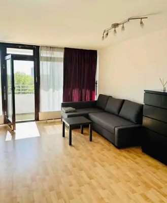 Ein Sitzbereich in der Unterkunft Schwabing-Studio great sunset view & balcony