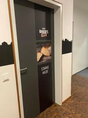 Ein Zertifikat, Auszeichnung, Logo oder anderes Dokument, das in der Unterkunft Baker`s Home ausgestellt ist