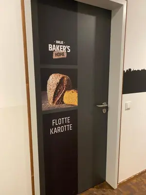 Ein Zertifikat, Auszeichnung, Logo oder anderes Dokument, das in der Unterkunft Baker`s Home ausgestellt ist