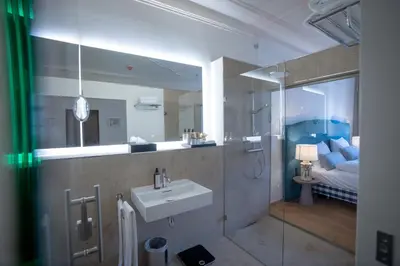 Ein Badezimmer in der Unterkunft Maxim Suites by Elias Holl