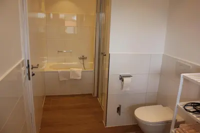Ein Badezimmer in der Unterkunft Schatzlhof Suite in Berg am Starnberger See