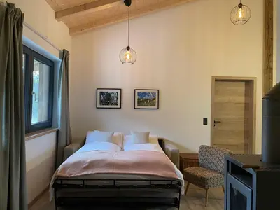 Ein Bett oder Betten in einem Zimmer der Unterkunft Ferienwohnung Zum Lenei