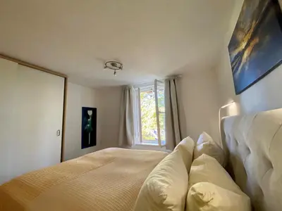 Ein Bett oder Betten in einem Zimmer der Unterkunft Ferienwohnung Prinzenhöhe