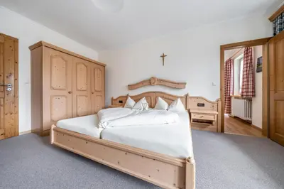 Ein Bett oder Betten in einem Zimmer der Unterkunft Lamprechthof