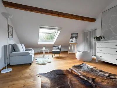 Ein Sitzbereich in der Unterkunft Ferienwohnung Wiesen