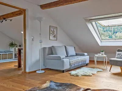 Ein Sitzbereich in der Unterkunft Ferienwohnung Wiesen