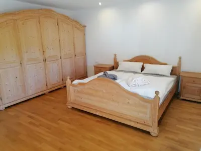 Ein Bett oder Betten in einem Zimmer der Unterkunft Ferienhaus am Kellpointhof