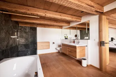 Ein Badezimmer in der Unterkunft Villa Tegernsee - Exclusive Lakefront Villa with private Zirben Sauna, 4 Rooms for Family & Friends