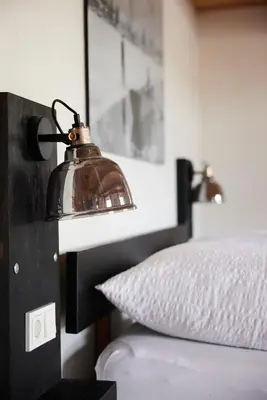 Ein Bett oder Betten in einem Zimmer der Unterkunft Villa Tegernsee - Exclusive Lakefront Villa with private Zirben Sauna, 4 Rooms for Family & Friends
