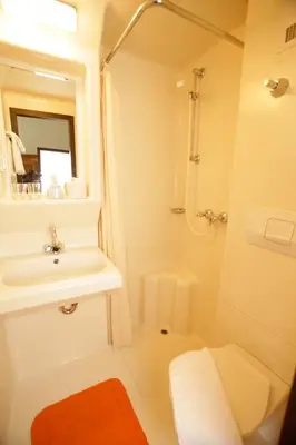 Ein Badezimmer in der Unterkunft Gästehaus Ethiko