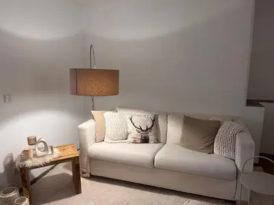 Ein Sitzbereich in der Unterkunft Ferienwohnung Agena