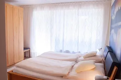 Ein Bett oder Betten in einem Zimmer der Unterkunft Karwendelstern -625-