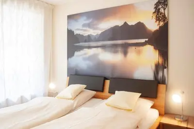 Ein Bett oder Betten in einem Zimmer der Unterkunft Karwendelstern -625-