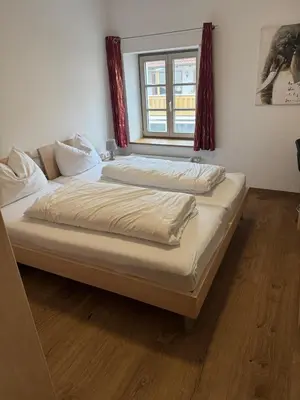 Ein Bett oder Betten in einem Zimmer der Unterkunft Hotel Restaurant Zum Wendelwirt