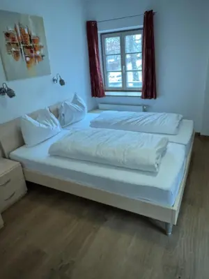 Ein Bett oder Betten in einem Zimmer der Unterkunft Hotel Restaurant Zum Wendelwirt