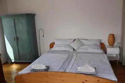 Ein Bett oder Betten in einem Zimmer der Unterkunft Stadtvilla