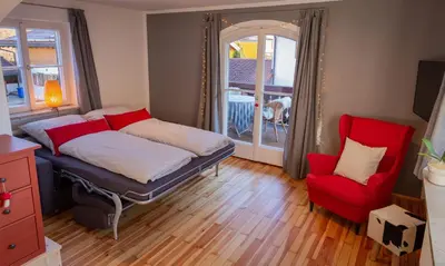Ein Bett oder Betten in einem Zimmer der Unterkunft Papa Joe`s Ferienwohnung in Garmisch