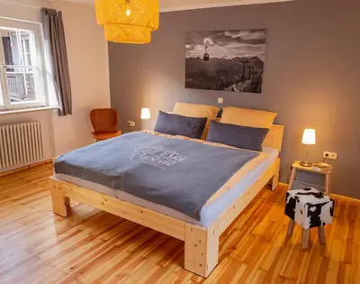 Ein Bett oder Betten in einem Zimmer der Unterkunft Papa Joe`s Ferienwohnung in Garmisch