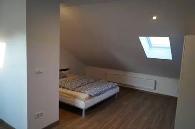 Ein Bett oder Betten in einem Zimmer der Unterkunft Apartment Gars am Inn