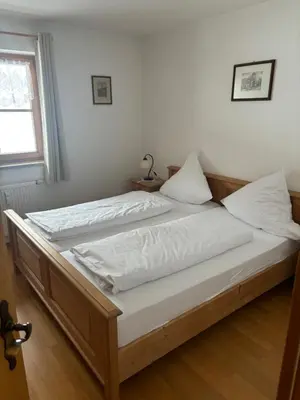 Ein Bett oder Betten in einem Zimmer der Unterkunft Sonnenblick