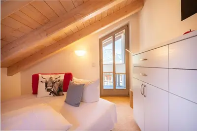 Ein Bett oder Betten in einem Zimmer der Unterkunft Partnachauen