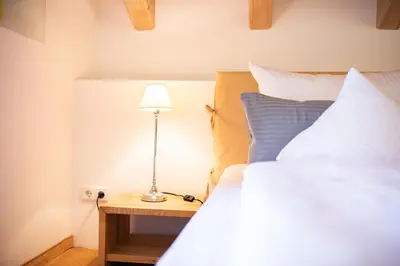 Ein Bett oder Betten in einem Zimmer der Unterkunft Partnachauen
