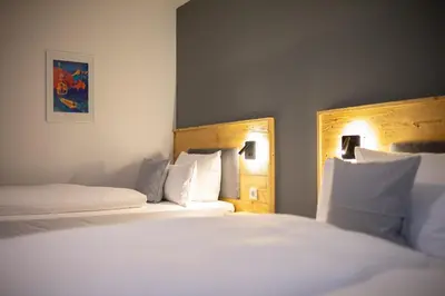 Ein Bett oder Betten in einem Zimmer der Unterkunft Mittendrin