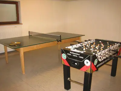 Eine Spielezimmer in der Unterkunft Erdgeschosswohnung 8 im Bergschlössl