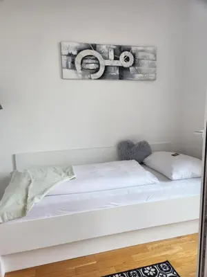 Ein Bett oder Betten in einem Zimmer der Unterkunft MyRoom - Munich Fair Apartments