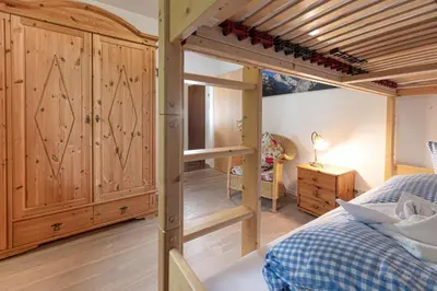 Ein Bett oder Betten in einem Zimmer der Unterkunft Fewo Karwendelspitzblick