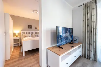 Ein Bett oder Betten in einem Zimmer der Unterkunft Bergjuwel