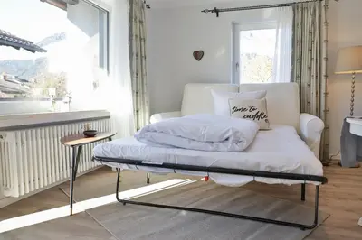 Ein Bett oder Betten in einem Zimmer der Unterkunft Bergjuwel