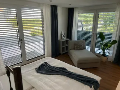 Ein Bett oder Betten in einem Zimmer der Unterkunft Bhome Serviced Apartments