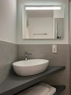 Ein Badezimmer in der Unterkunft Bhome Serviced Apartments
