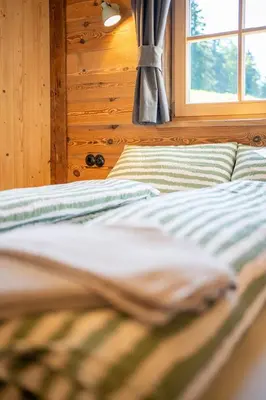 Ein Bett oder Betten in einem Zimmer der Unterkunft Gloans Glück Ferienhaus