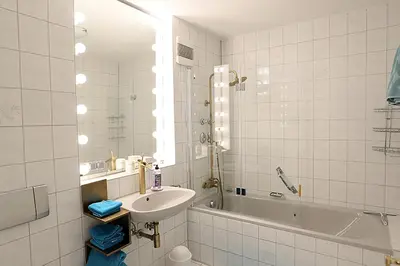 Ein Badezimmer in der Unterkunft Ferienwohnung ARTE HAFEN
