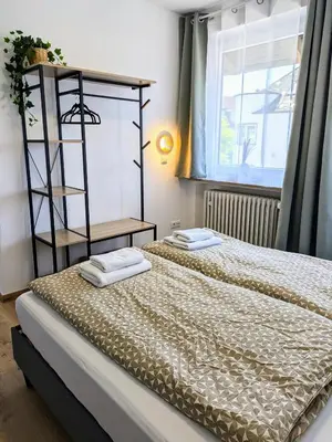 Ein Bett oder Betten in einem Zimmer der Unterkunft Ferienwohnungen Marcushof
