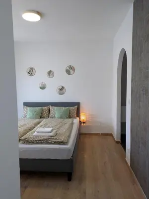 Ein Bett oder Betten in einem Zimmer der Unterkunft Ferienwohnungen Marcushof