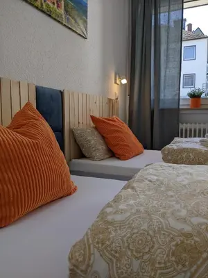 Ein Bett oder Betten in einem Zimmer der Unterkunft Ferienwohnungen Marcushof
