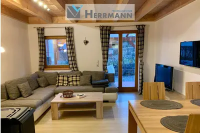 Ein Sitzbereich in der Unterkunft Feriendorf Via Claudia Ferienhaus Martin