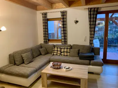 Ein Sitzbereich in der Unterkunft Feriendorf Via Claudia Ferienhaus Martin